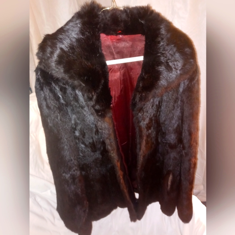 Women's size lg. GENUINE BLACK RABBIT FUR COAT